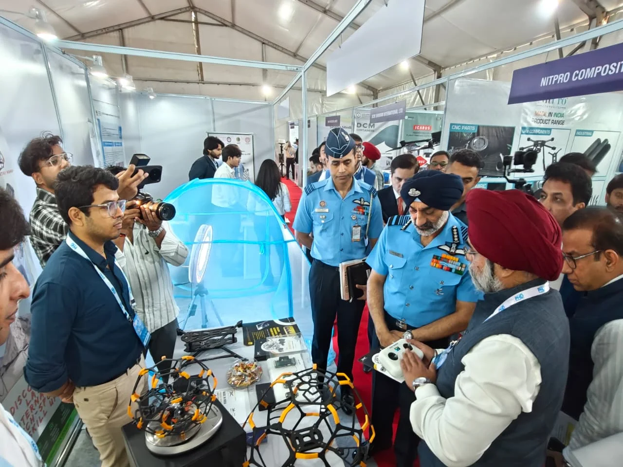 Wg Cdr Bhupinder S Nijjar (Retd.) and Indian Air Force leadership reviewing the BeeZeta1 Nano drone at Drone Expo 2026