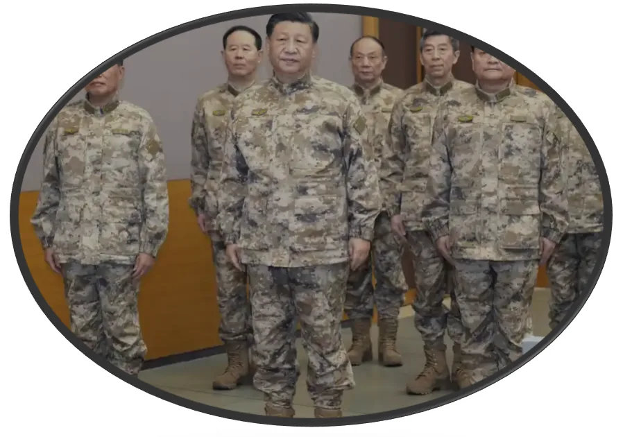 Chinese President Xi Jinping standing with senior military officers, all dressed in camouflage combat uniforms